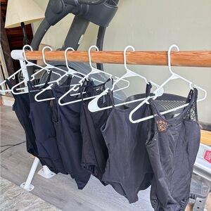 6 women’s medium black leotards